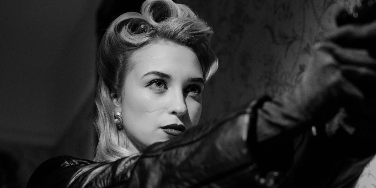 A female detective in a rain-slicked futuristic city, embodying psychic noir themes and mystery.
