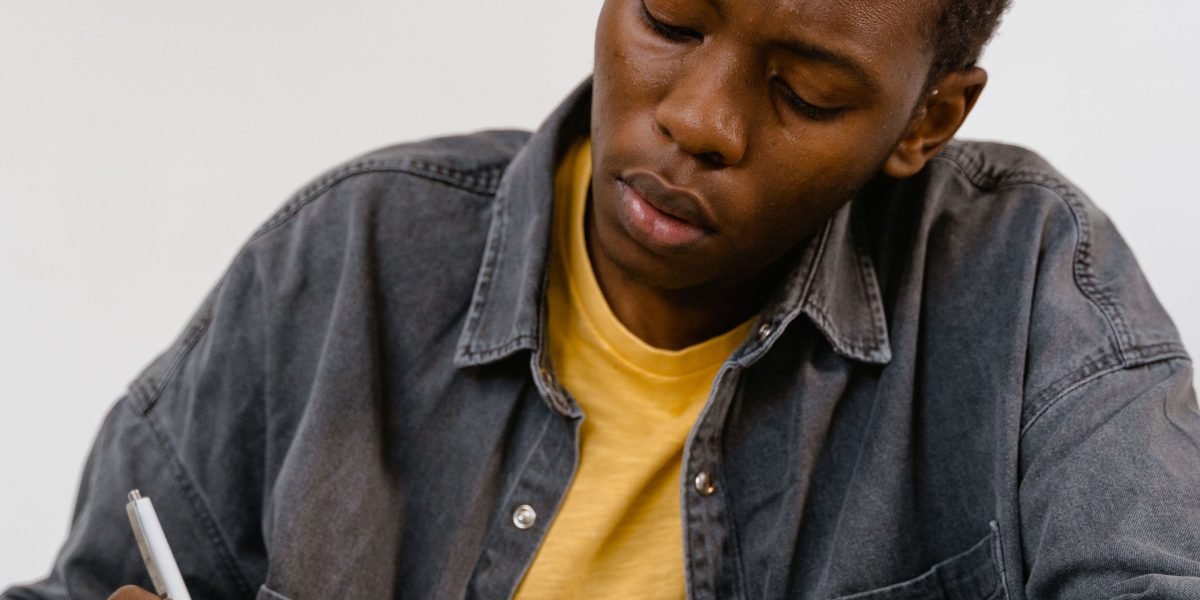 An author reflecting on experiences that infuse their work with unique themes and tone.